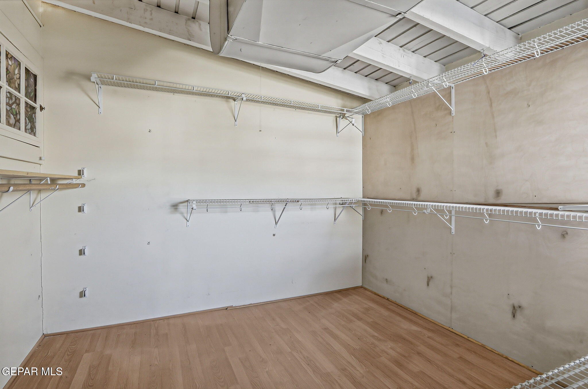 525 Corto Way El Paso, TX 79902 - Photo 40 of 98 a view of a room with racks on the wall