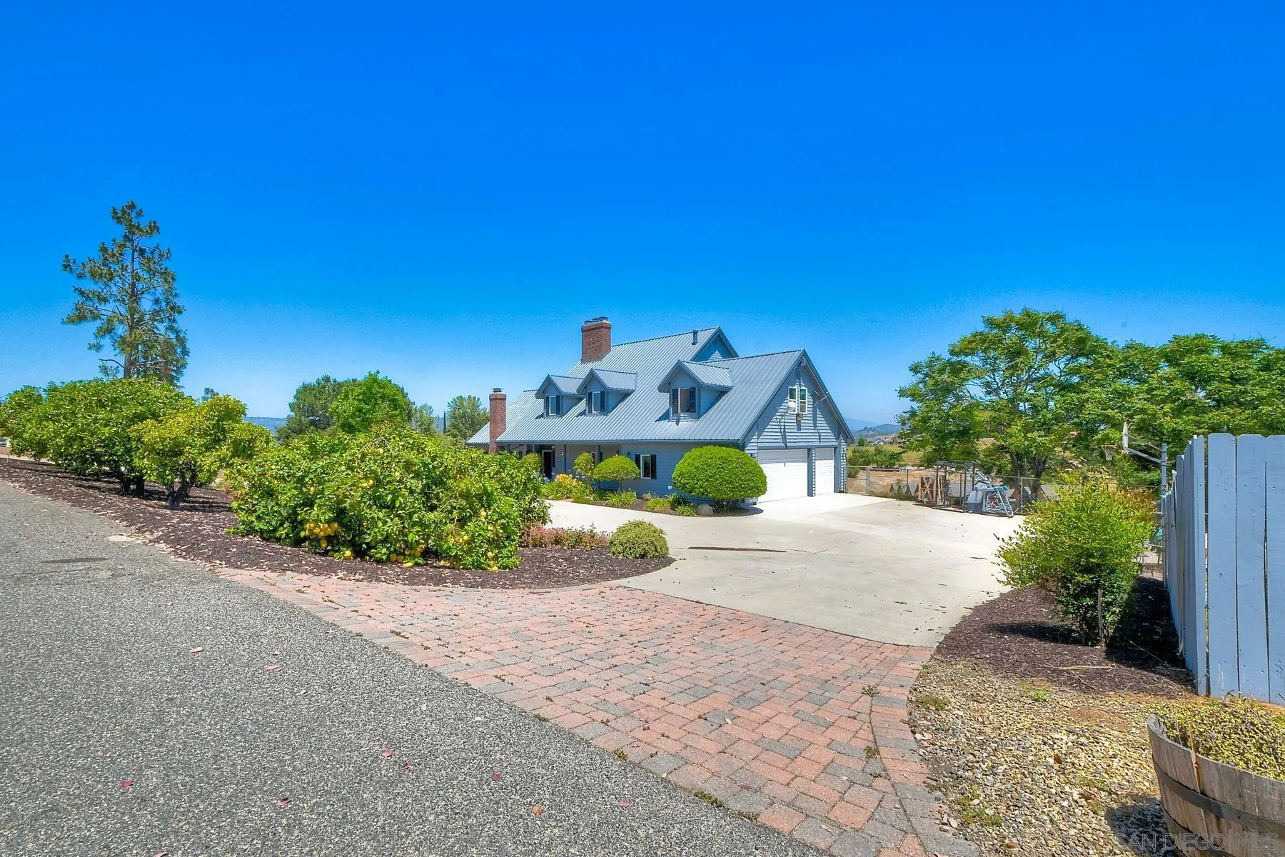 2511 Vía Rancheros Fallbrook, CA 92028 - Photo 13 of 59 a view of a house with a street
