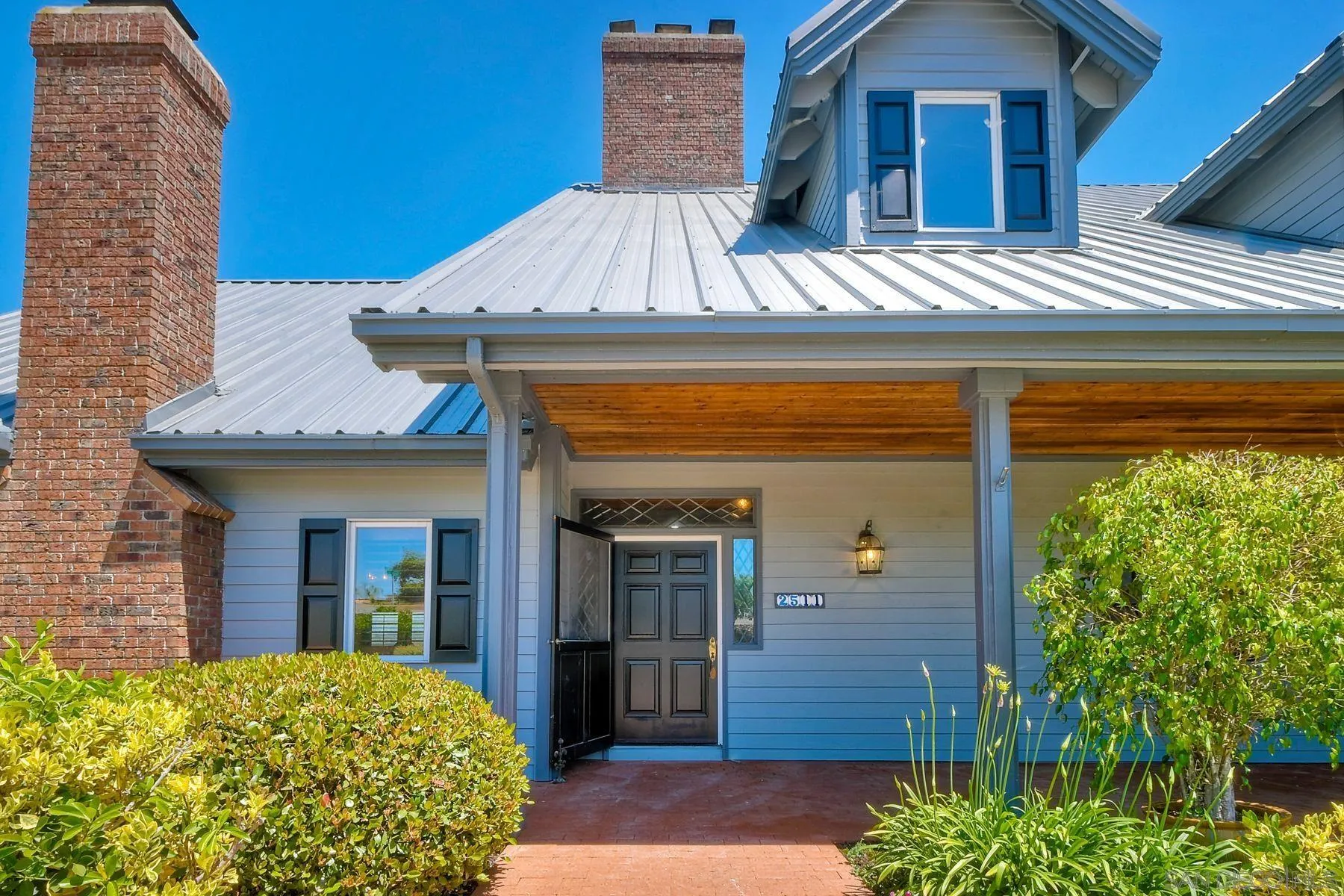 2511 Vía Rancheros Fallbrook, CA 92028 - Photo 16 of 59 a view of a house with a door