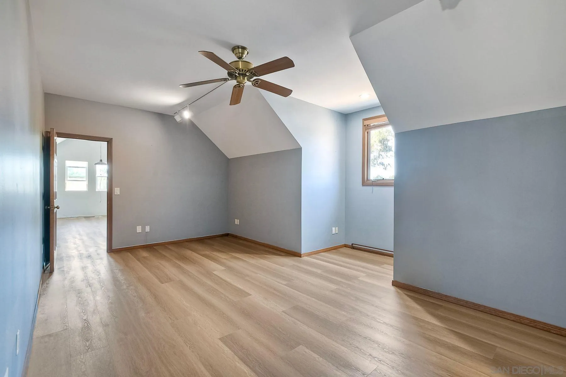 2511 Vía Rancheros Fallbrook, CA 92028 - Photo 30 of 59 an empty room with wooden floor closet and windows