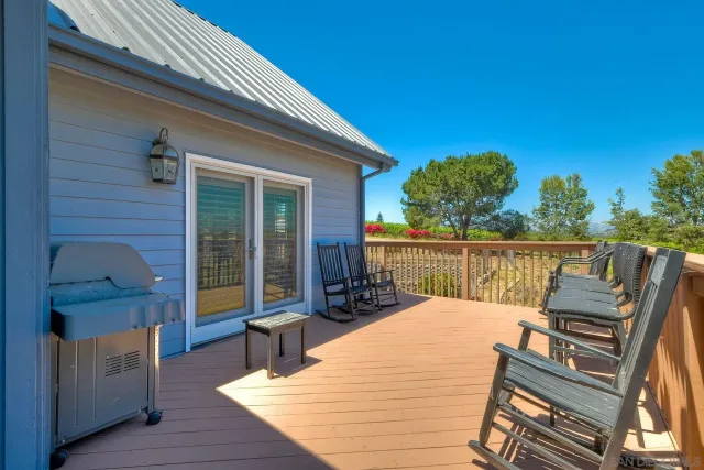 a view of a swimming pool with lounge chairs