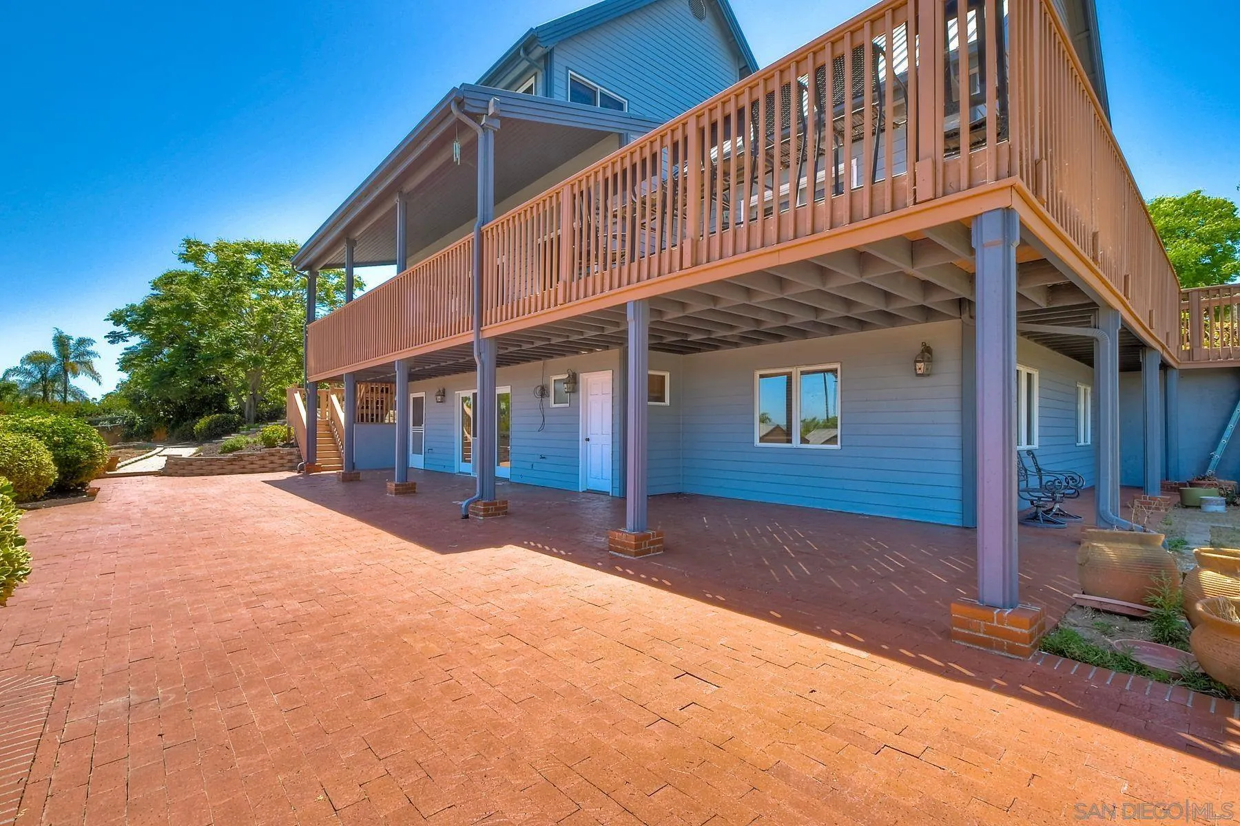 2511 Vía Rancheros Fallbrook, CA 92028 - Photo 48 of 59 a front view of a house with a yard