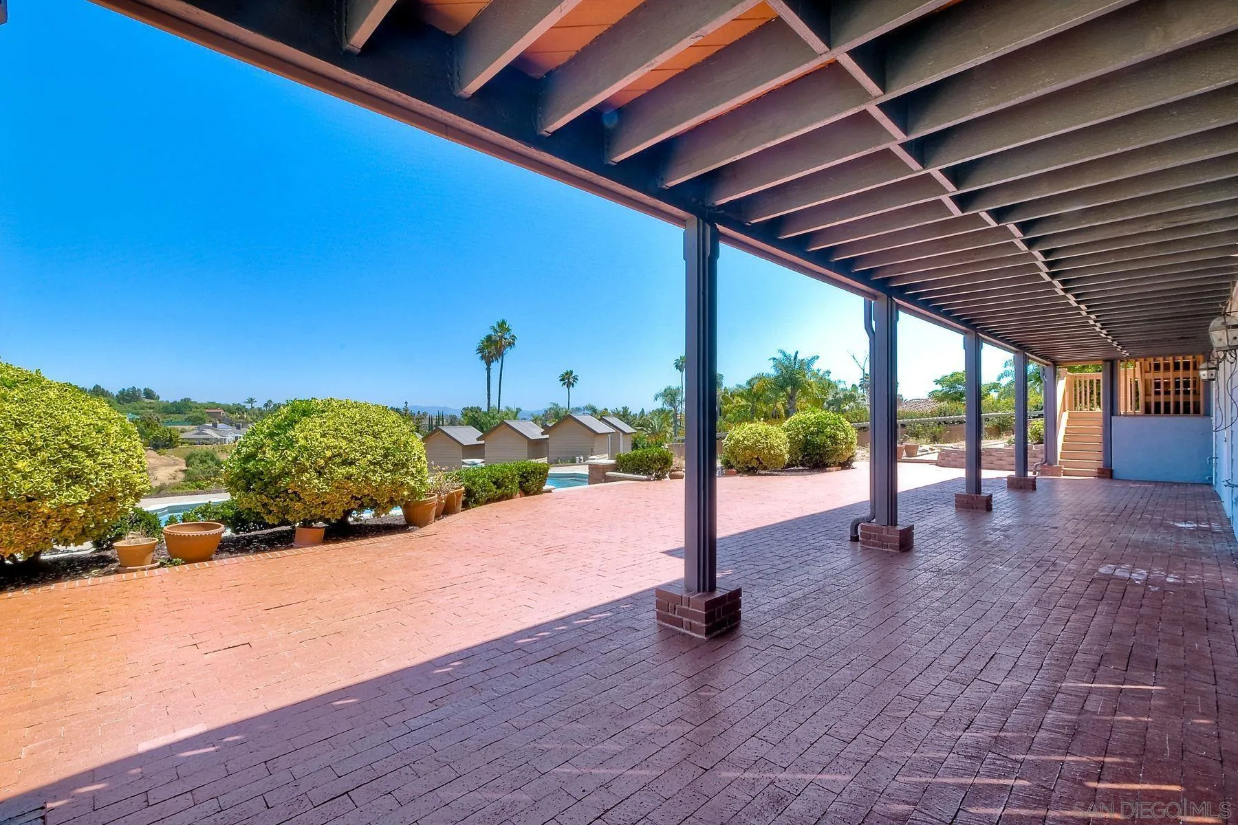 2511 Vía Rancheros Fallbrook, CA 92028 - Photo 49 of 59 a porch with lots of green space