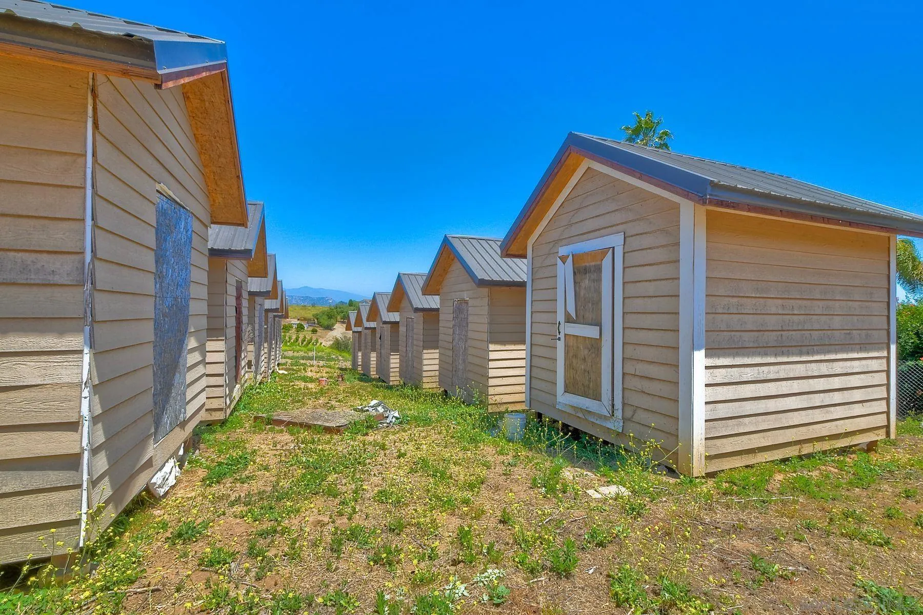 2511 Vía Rancheros Fallbrook, CA 92028 - Photo 52 of 59 a view of a house with a yard