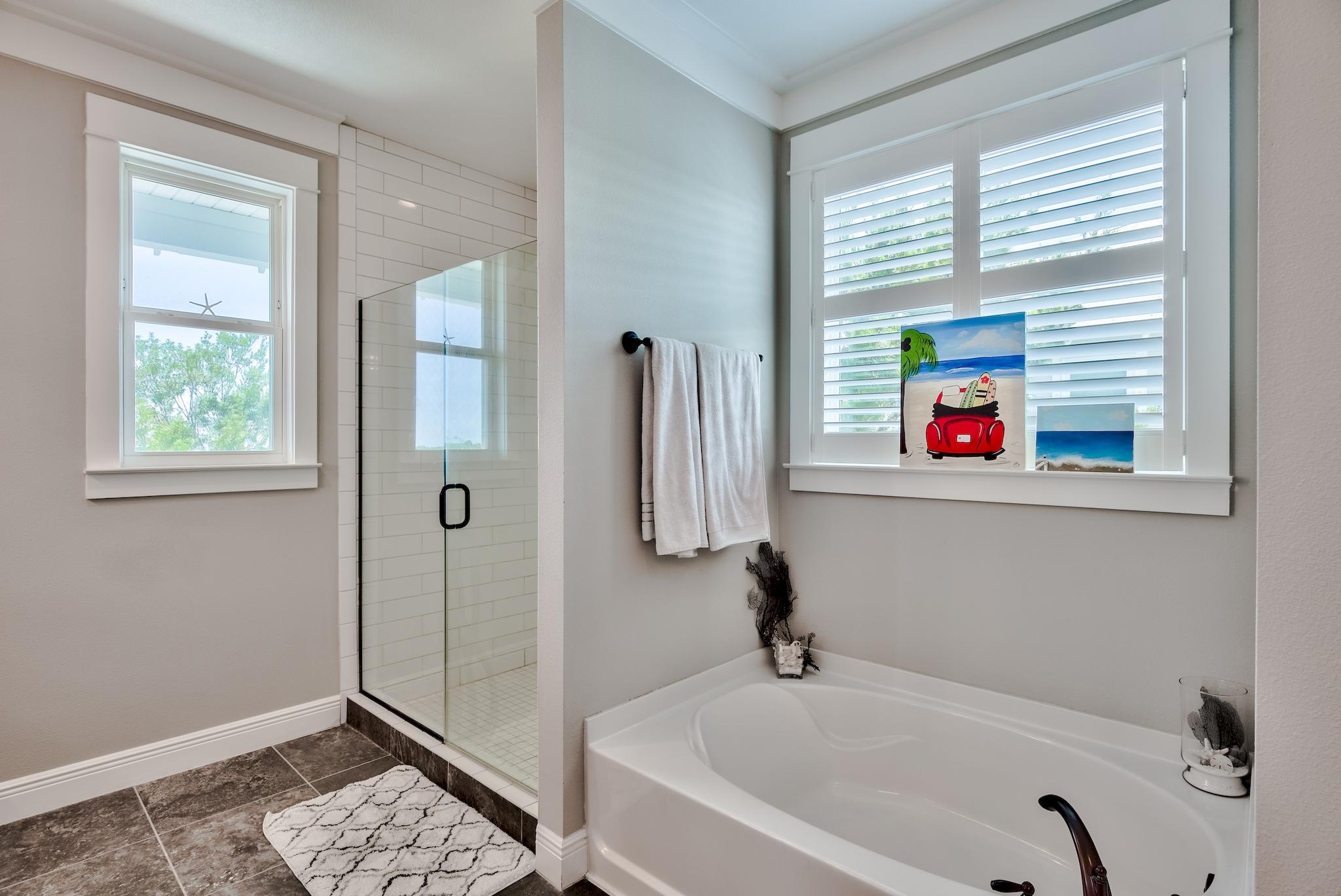5 Inlet Cove Inlet Beach, FL 32461 - Photo 28 of 52 a bathroom with a tub and a window