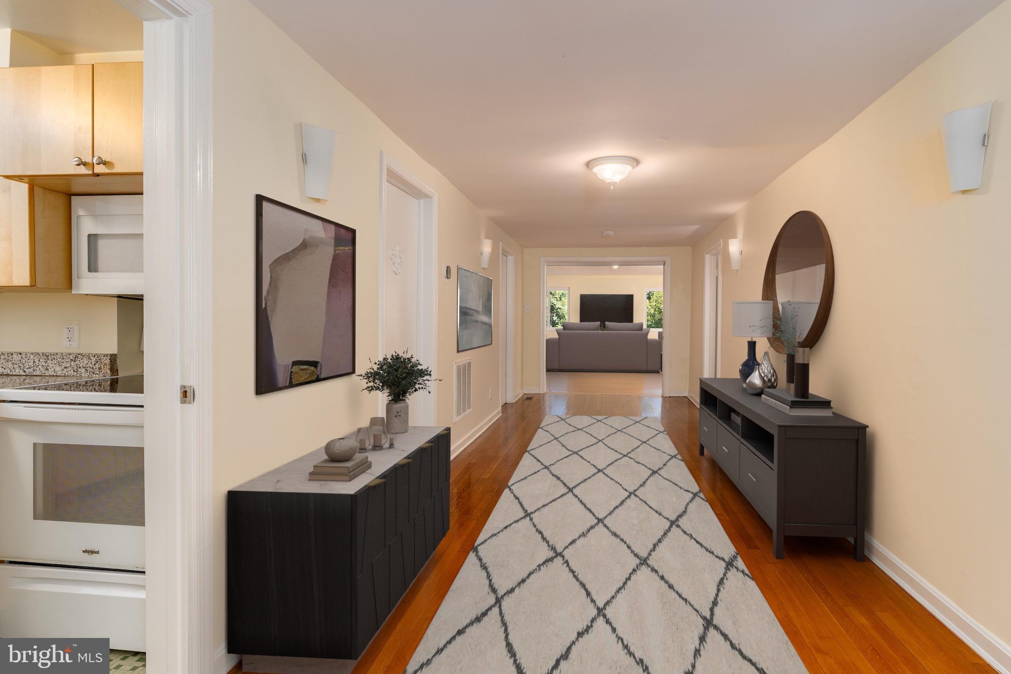 6221 Walhonding Road Bethesda, MD 20816 - Photo 2 of 51 a view of living room with furniture and flat screen tv