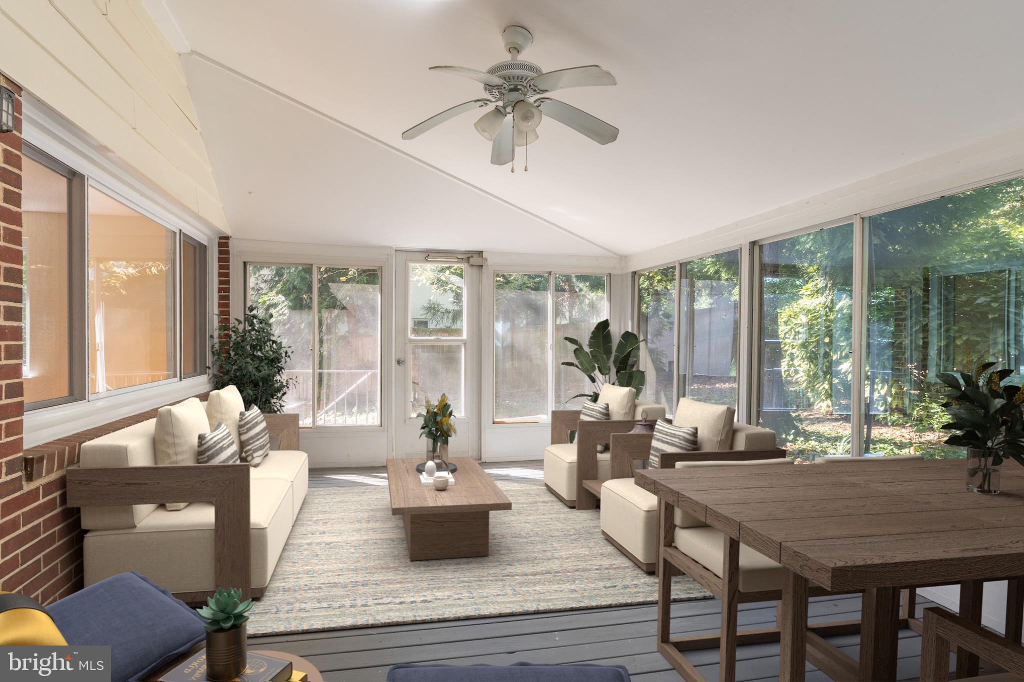 6221 Walhonding Road Bethesda, MD 20816 - Photo 22 of 51 a living room with furniture and a potted plant