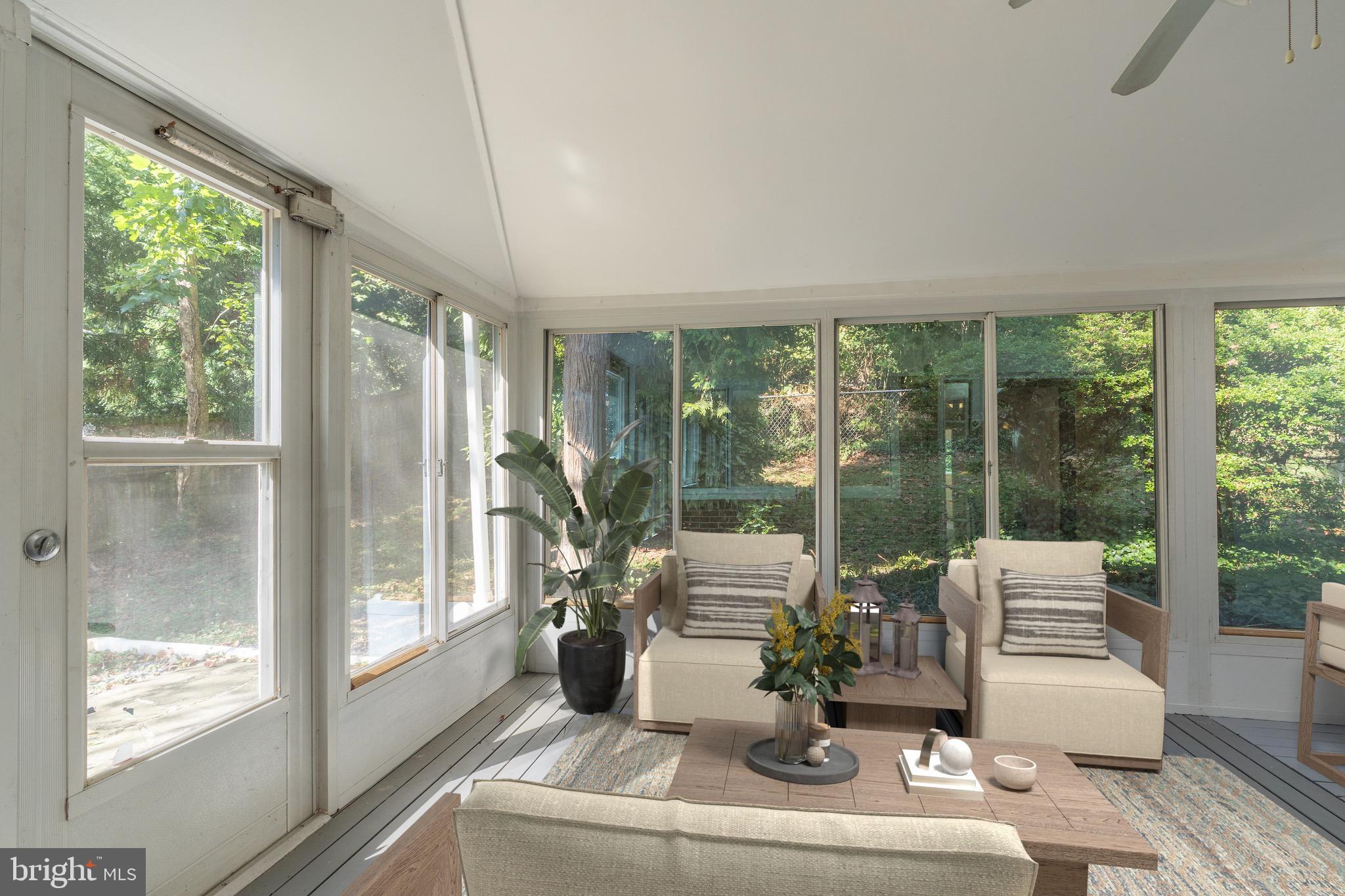 6221 Walhonding Road Bethesda, MD 20816 - Photo 24 of 51 a living room with furniture and a large window