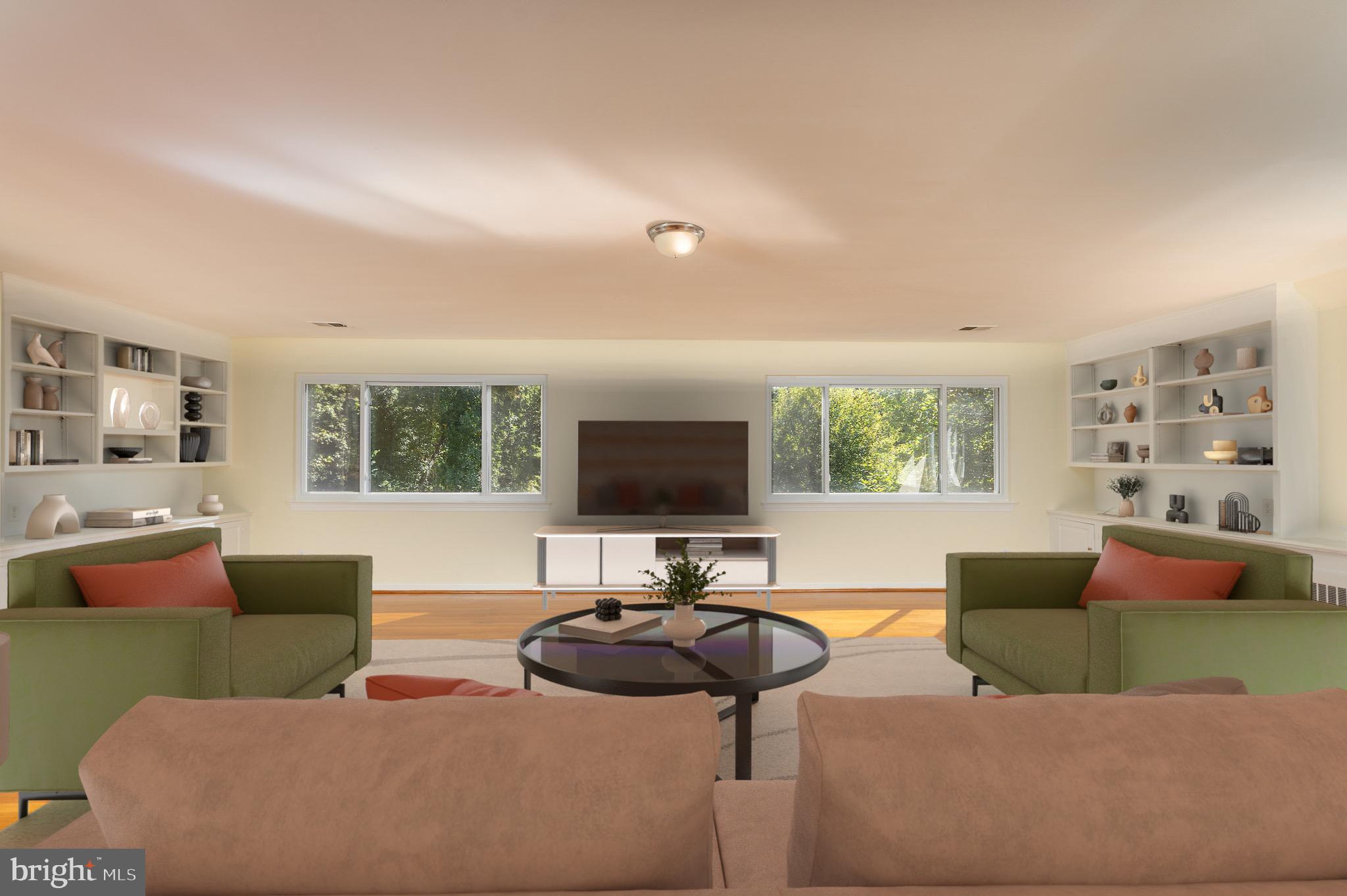 6221 Walhonding Road Bethesda, MD 20816 - Photo 5 of 51 a living room with furniture and a flat screen tv