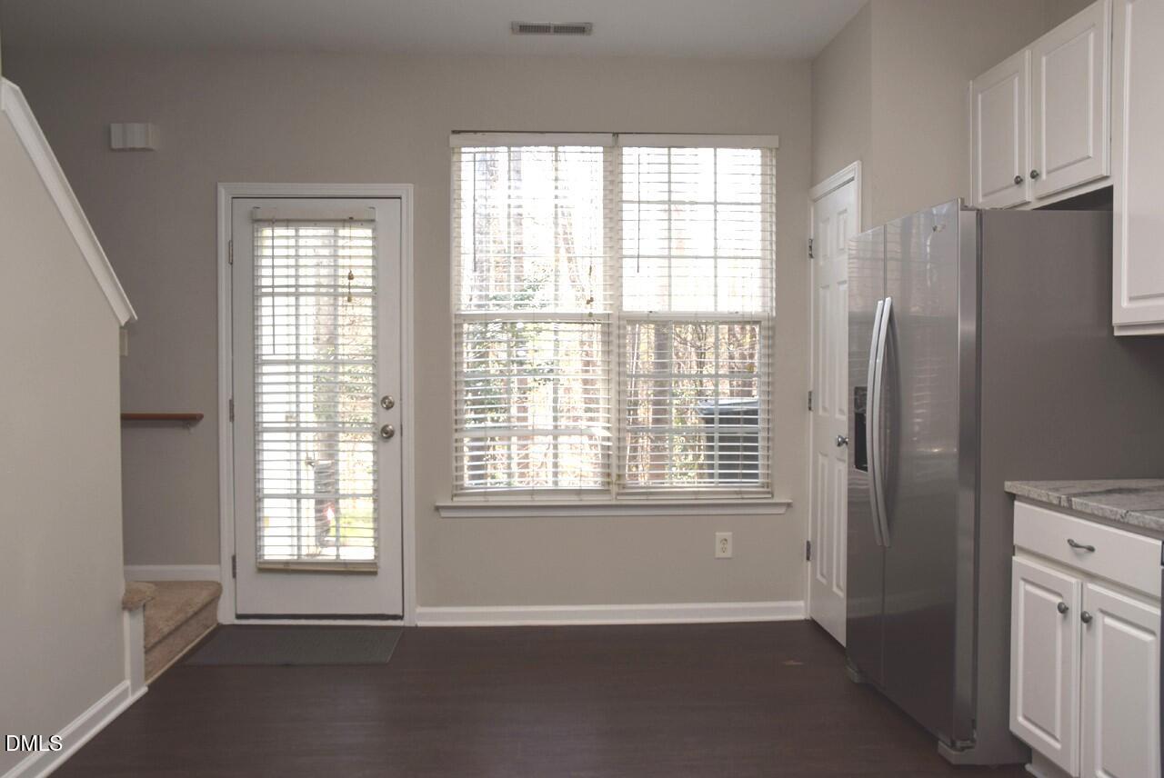8269 City Loft Court Raleigh, NC 27613 - Photo 12 of 26 a view of an empty room with a window