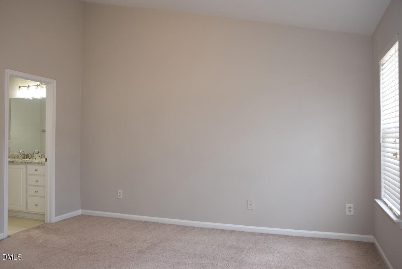 8269 City Loft Court Raleigh, NC 27613 - Photo 15 of 26 an empty room with windows