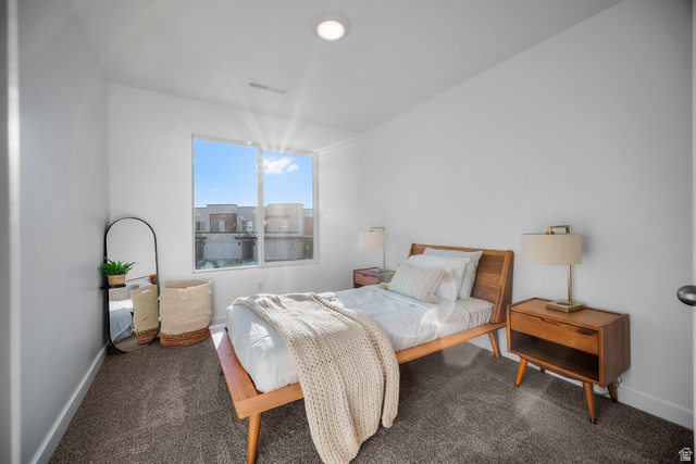 2202 Wolverine Way, Unit 2529 Washington, UT 84780 - Photo 15 of 27 Bedroom featuring a large window, recessed lighting, and carpet flooring
