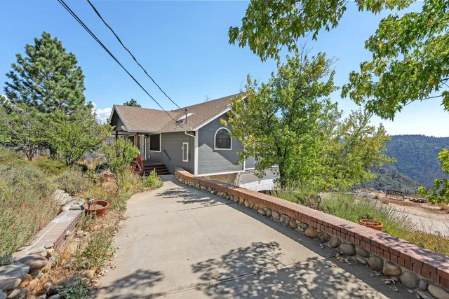 a house with trees in the background