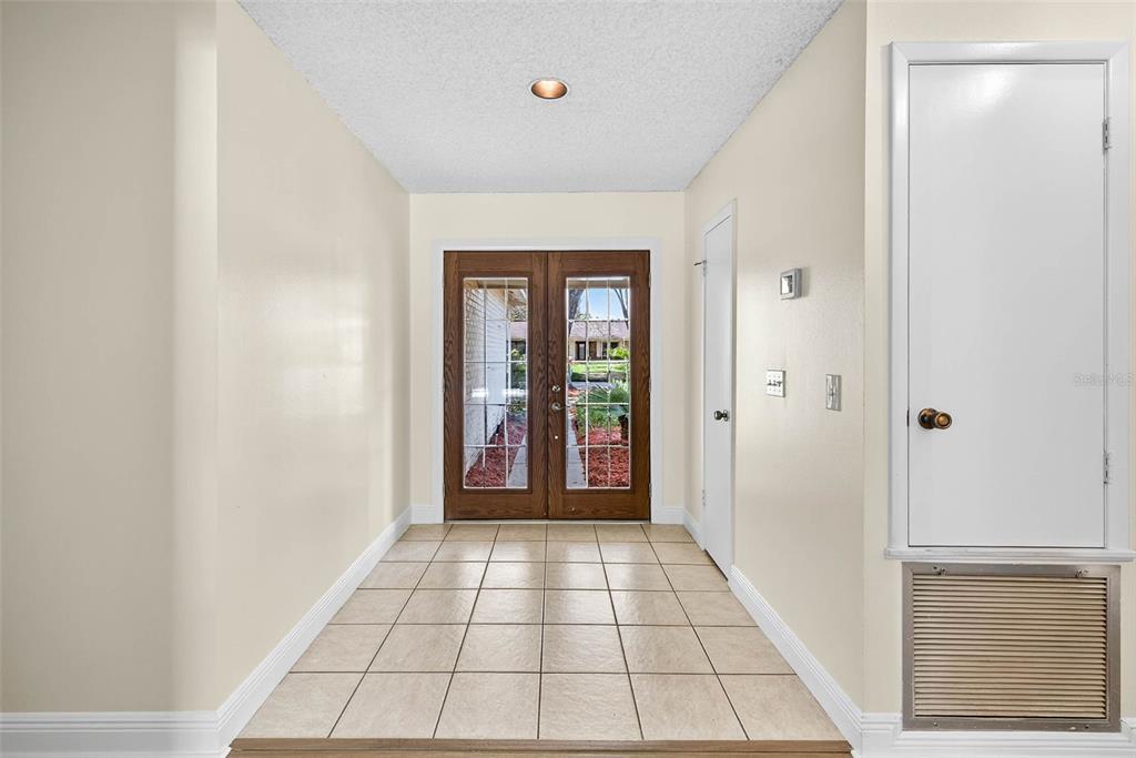 11009 Cinderlane Place Temple Terrace, FL 33617 - Photo 14 of 56 a view of an entryway with a window