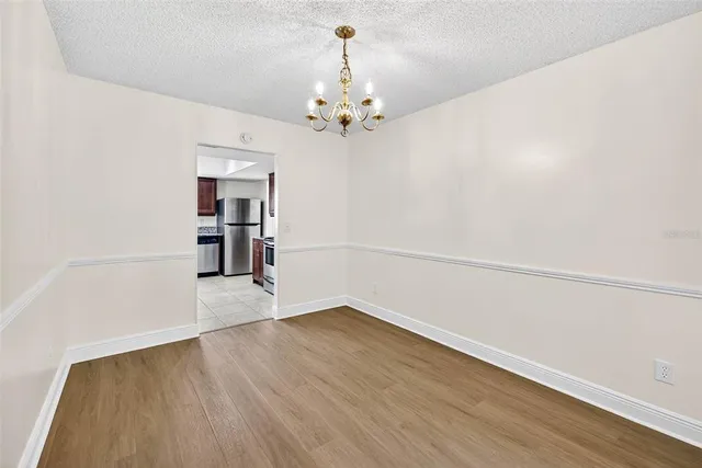 a view of a terrace with furniture and garden