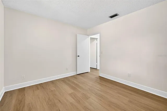 a view of a livingroom with furniture and a window