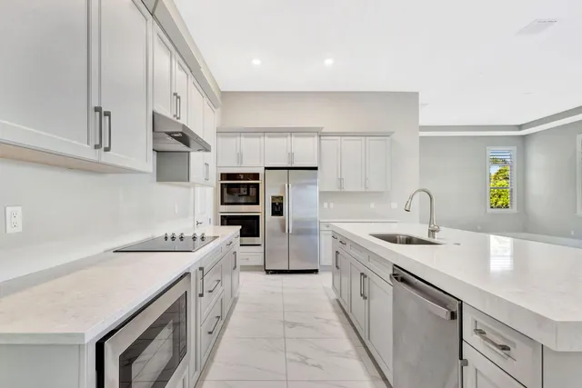 a bathroom with a sink a toilet and a bathtub