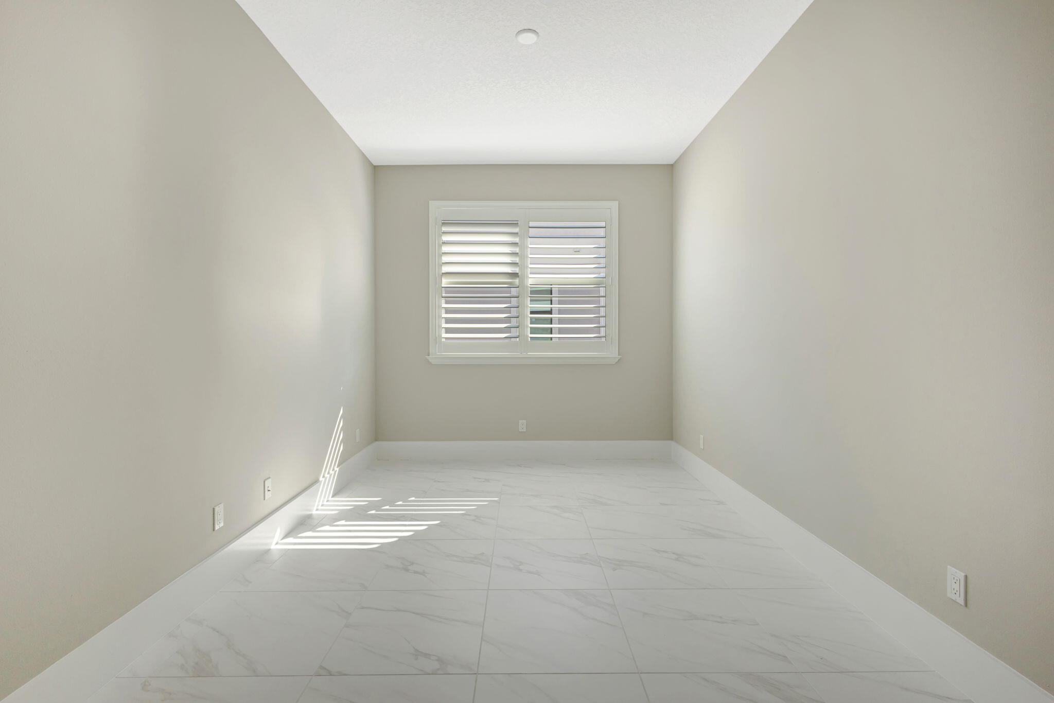 11953 Southwest Vano Way Port Port St. Lucie, FL 34987 - Photo 26 of 74 an empty room with a window