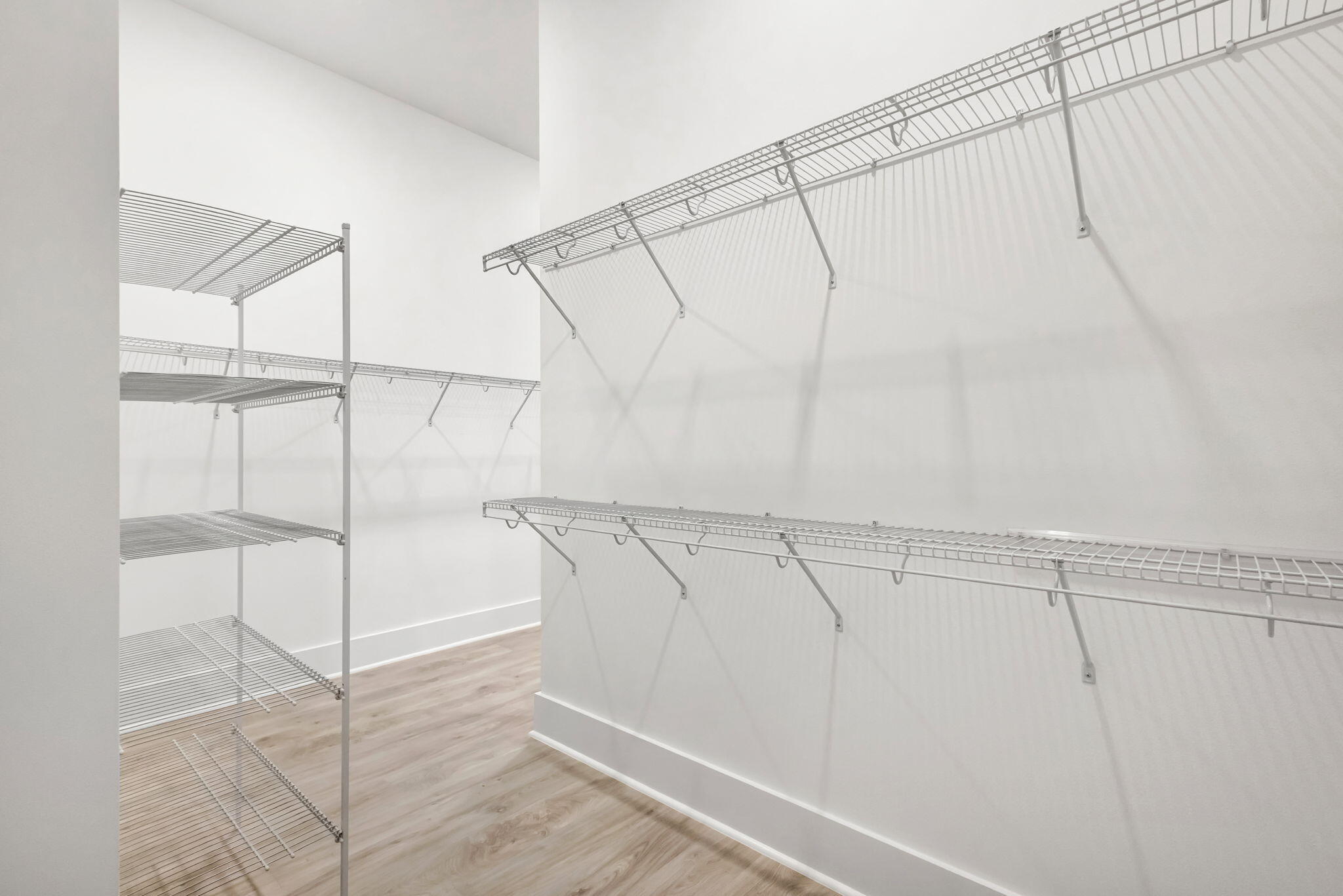 11953 Southwest Vano Way Port Port St. Lucie, FL 34987 - Photo 28 of 74 a view of a room with racks on the wall