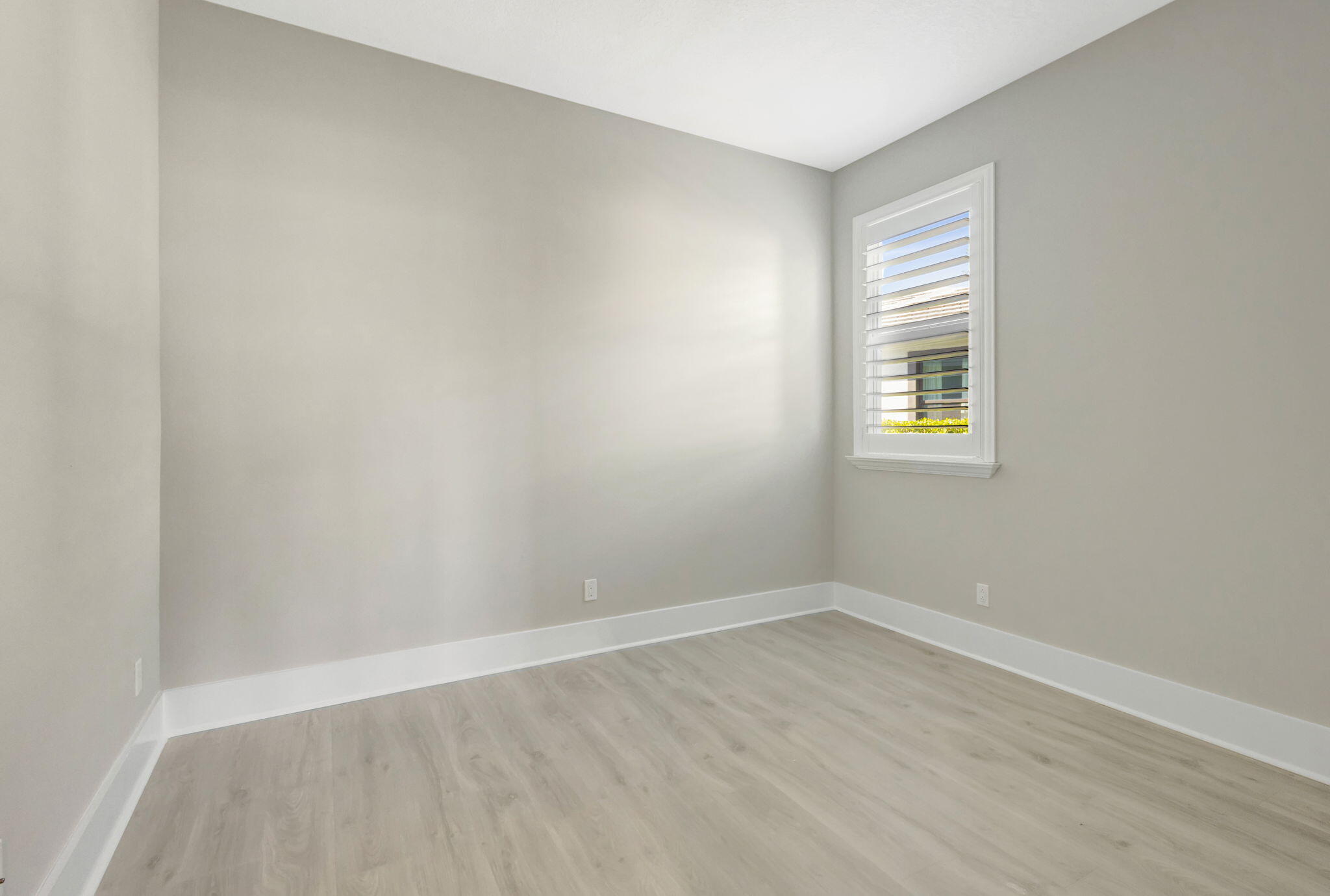 11953 Southwest Vano Way Port Port St. Lucie, FL 34987 - Photo 43 of 74 an empty room with a window