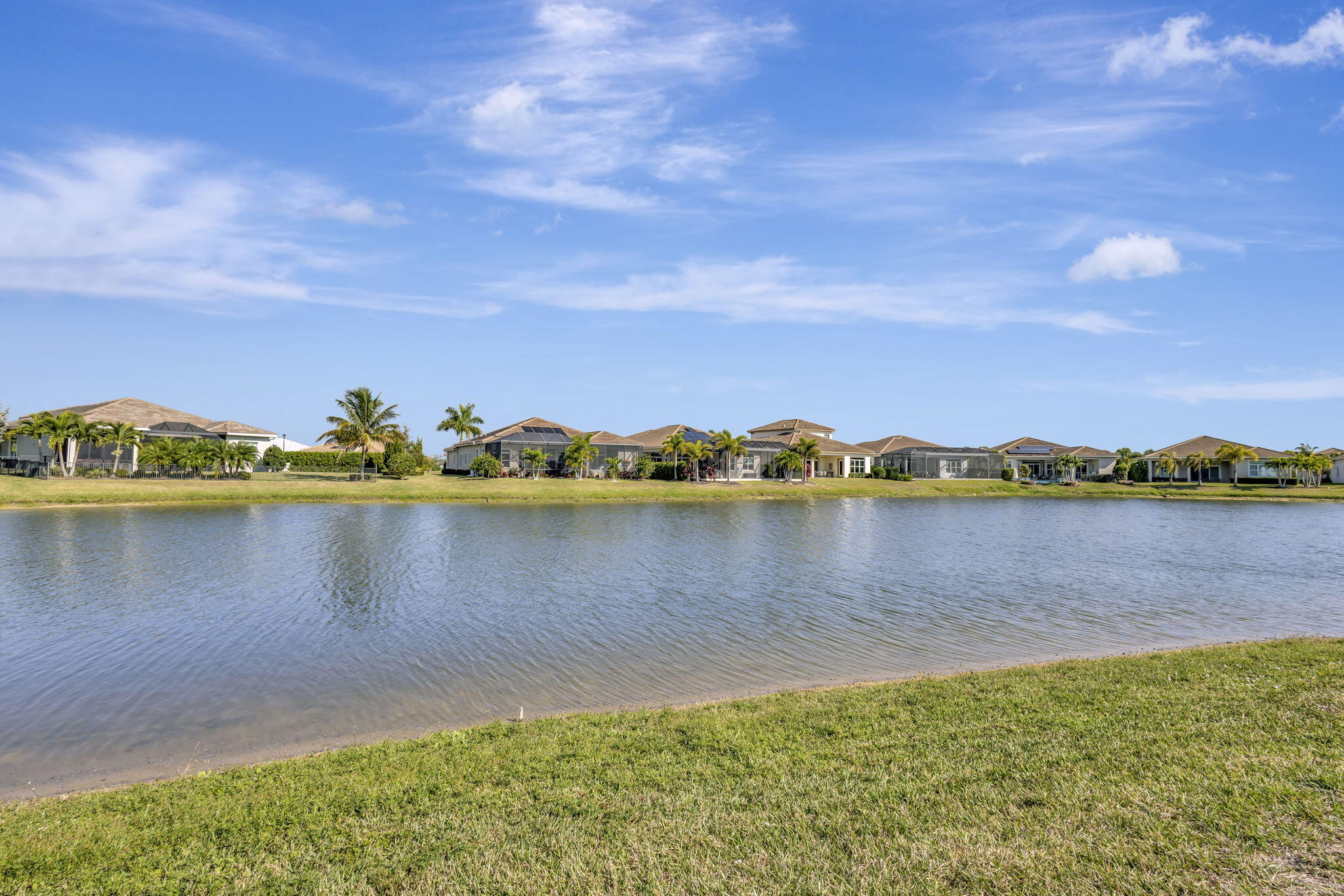 11953 Southwest Vano Way Port Port St. Lucie, FL 34987 - Photo 52 of 74 a view of a lake with a lake