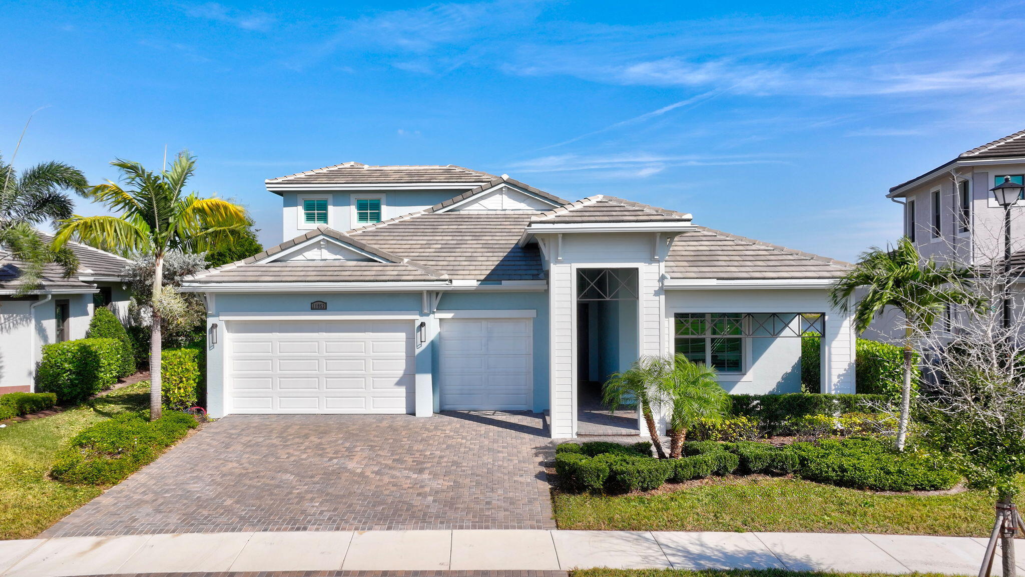 11953 Southwest Vano Way Port Port St. Lucie, FL 34987 - Photo 57 of 74 a front view of a house with a yard