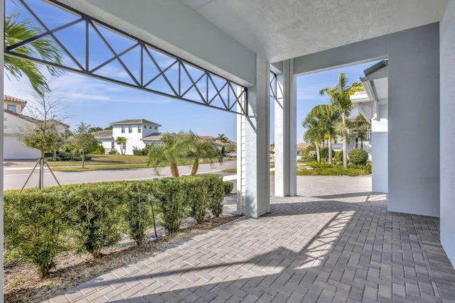 a view of kitchen with center island and stainless steel appliances