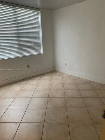 a bathroom with a sink a toilet and bathtub