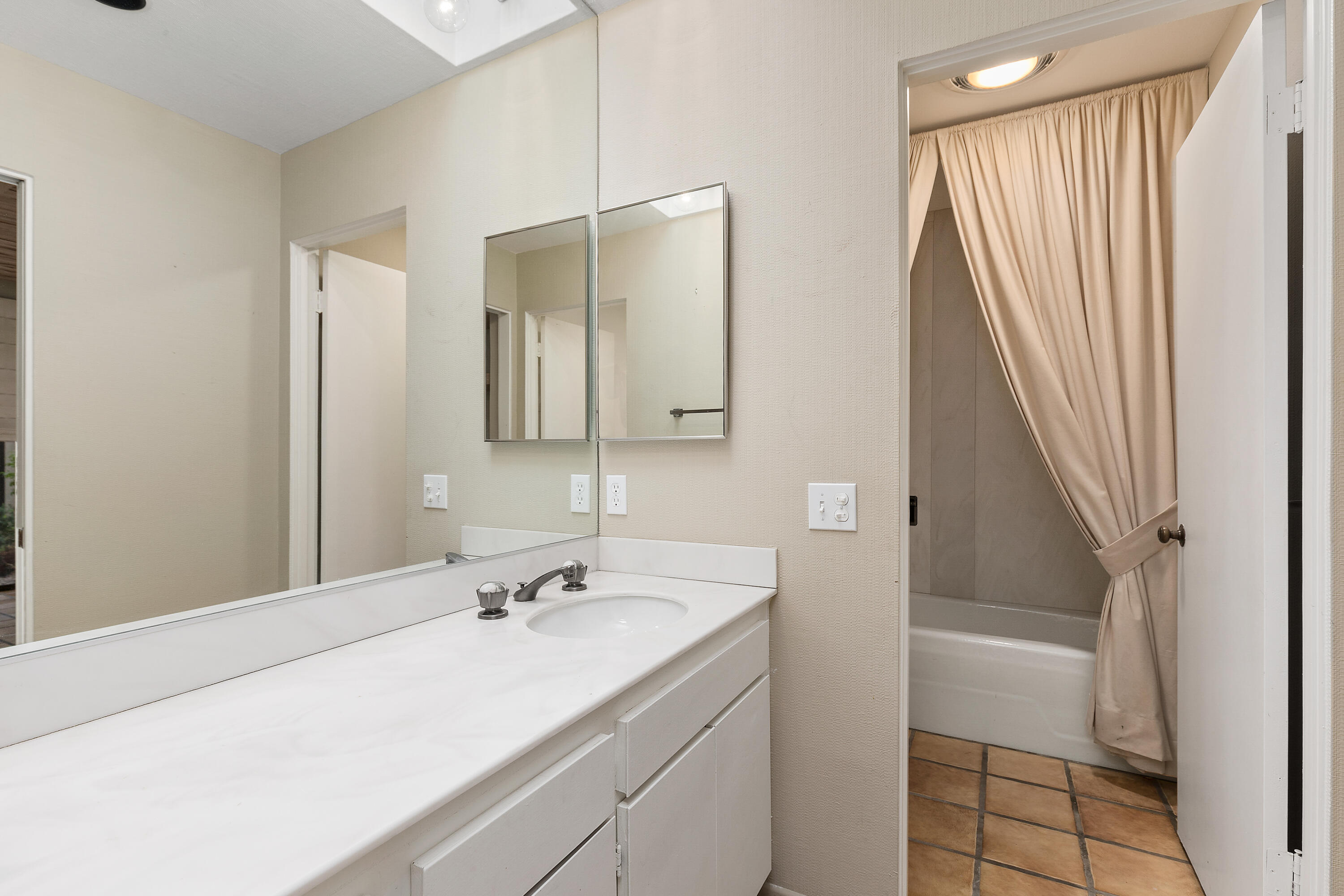 722 Inverness Drive Rancho Mirage, CA 92270 - Photo 21 of 59 a bathroom with a sink and a mirror