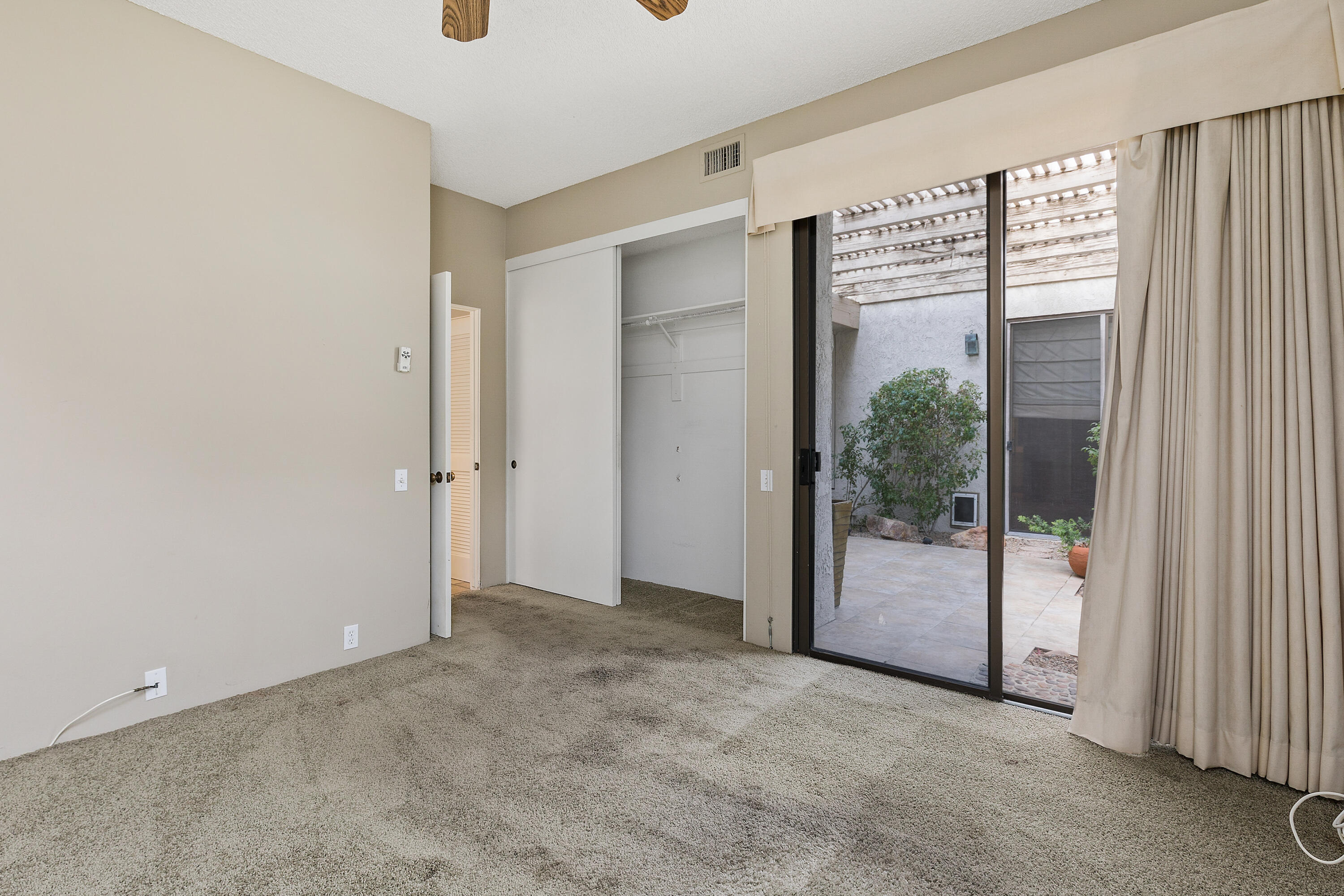 722 Inverness Drive Rancho Mirage, CA 92270 - Photo 23 of 59 an empty room with windows