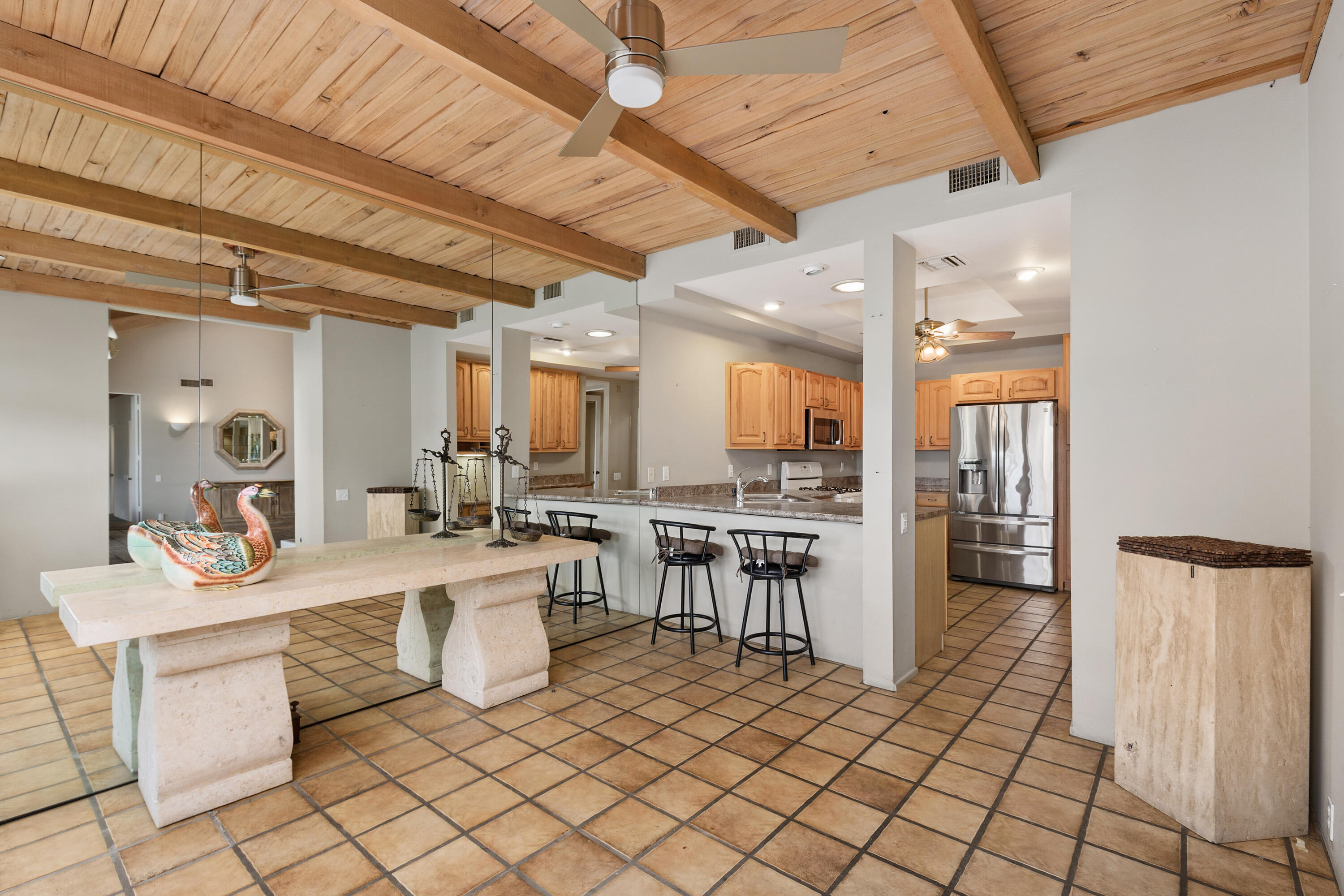 722 Inverness Drive Rancho Mirage, CA 92270 - Photo 3 of 59 a large white kitchen with a large window