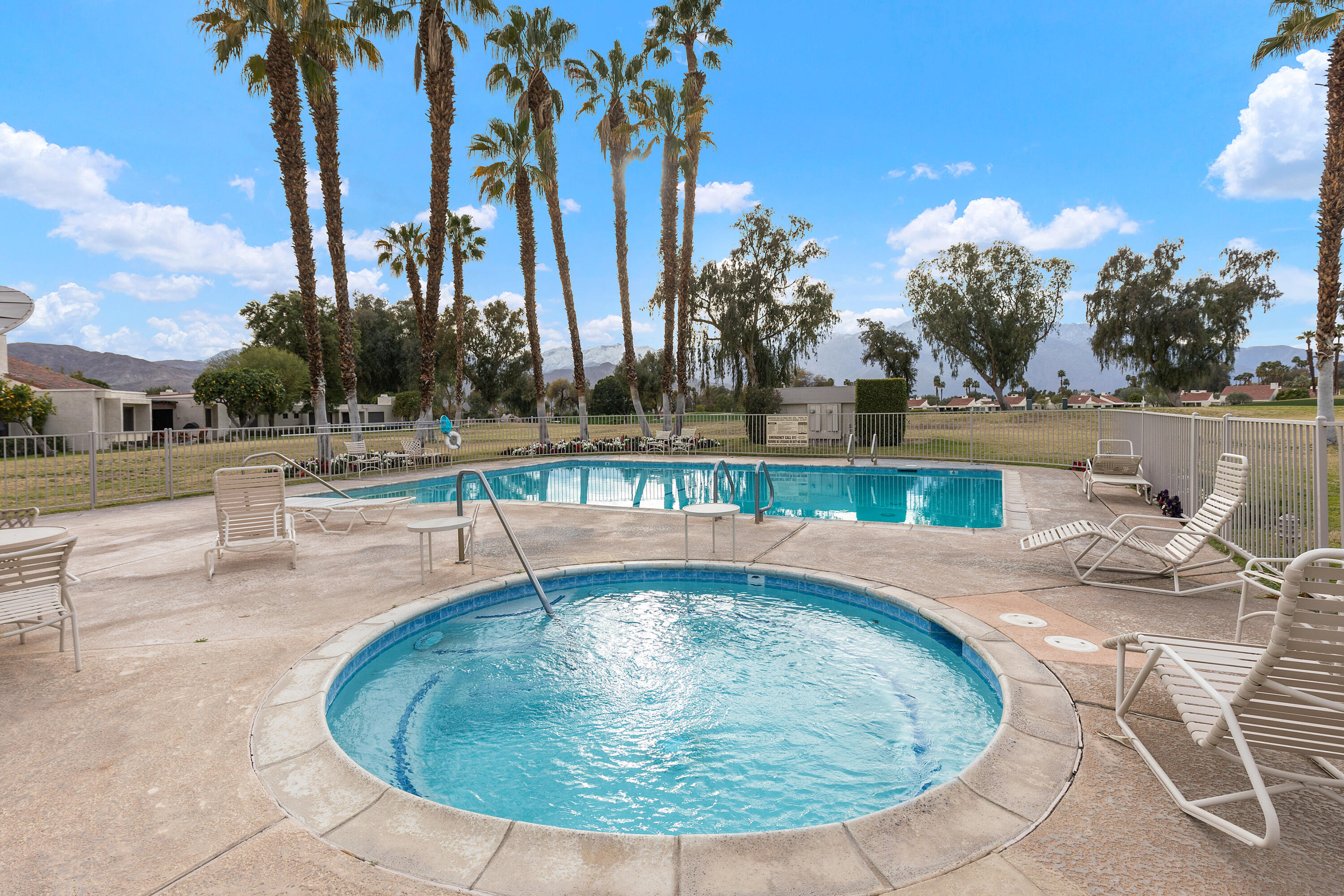 722 Inverness Drive Rancho Mirage, CA 92270 - Photo 33 of 59 a view of a swimming pool with a patio
