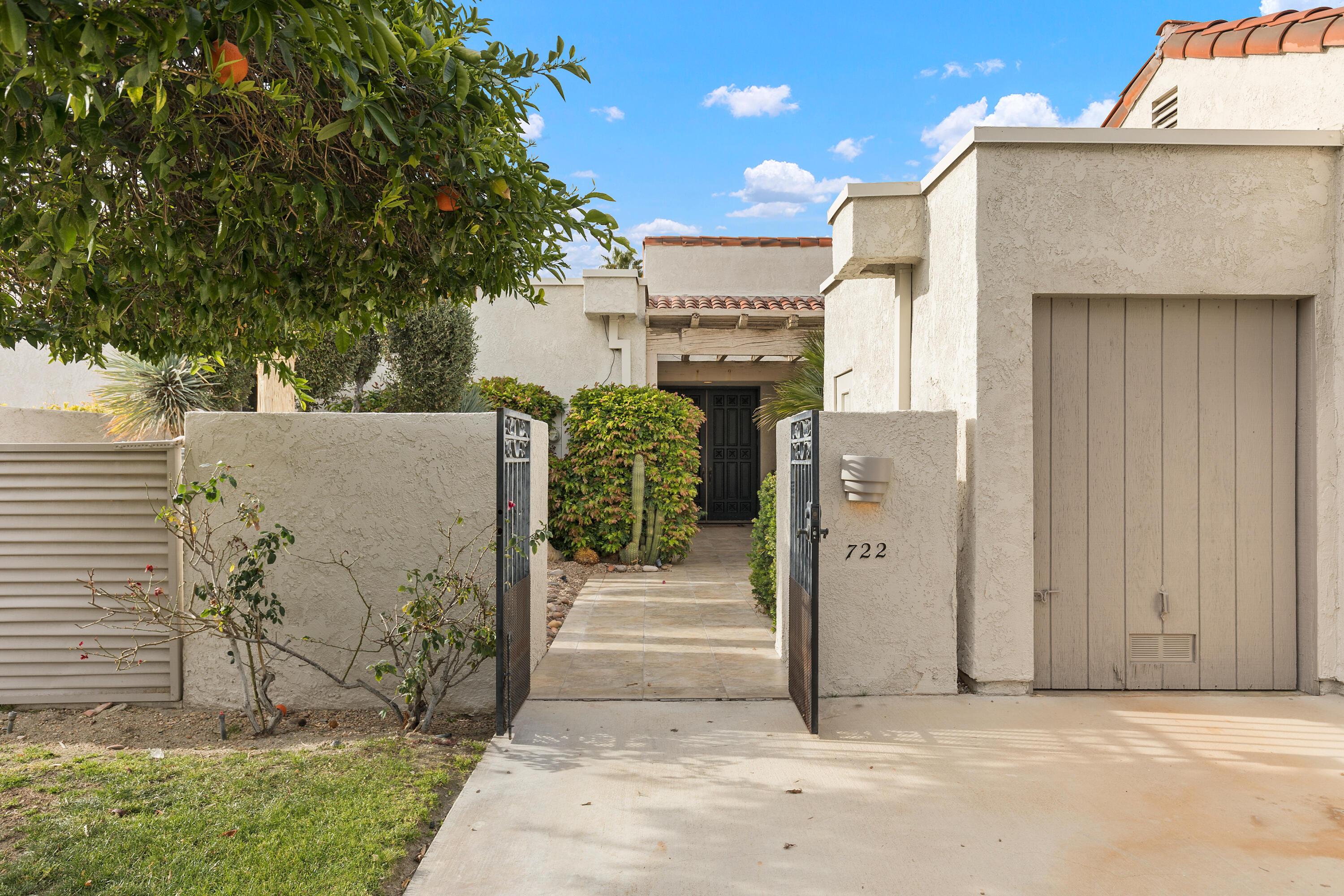 722 Inverness Drive Rancho Mirage, CA 92270 - Photo 9 of 59 a view of a house with a yard