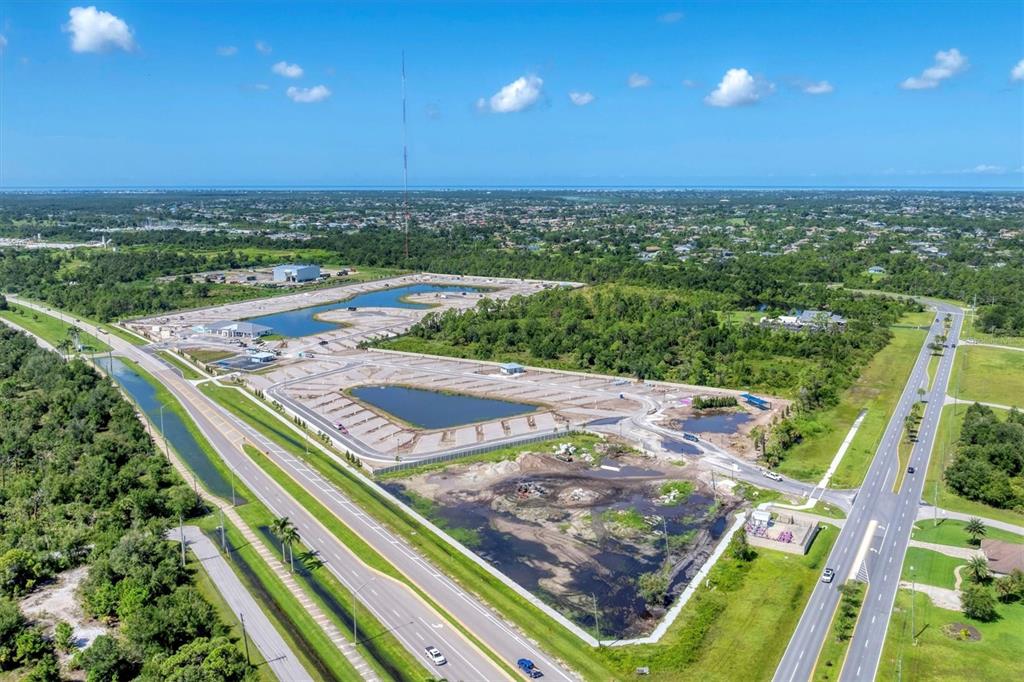 9001 Gasparilla Road, Unit 99 Placida, FL 33947 - Photo 16 of 75 a view of a swimming pool with a yard