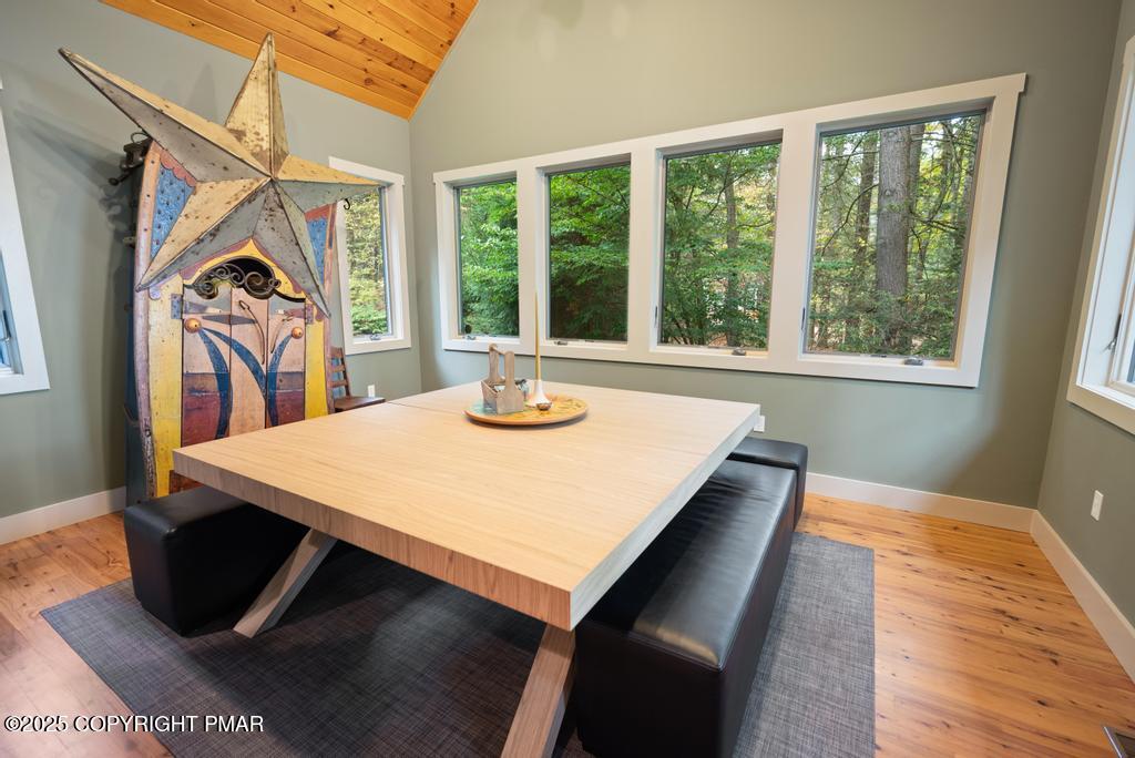106 Waygood Way Pocono Pines, PA 18350 - Photo 15 of 66 a view of a dining room with furniture and a window
