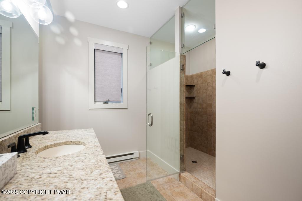 106 Waygood Way Pocono Pines, PA 18350 - Photo 20 of 66 a bathroom with a shower and a sink
