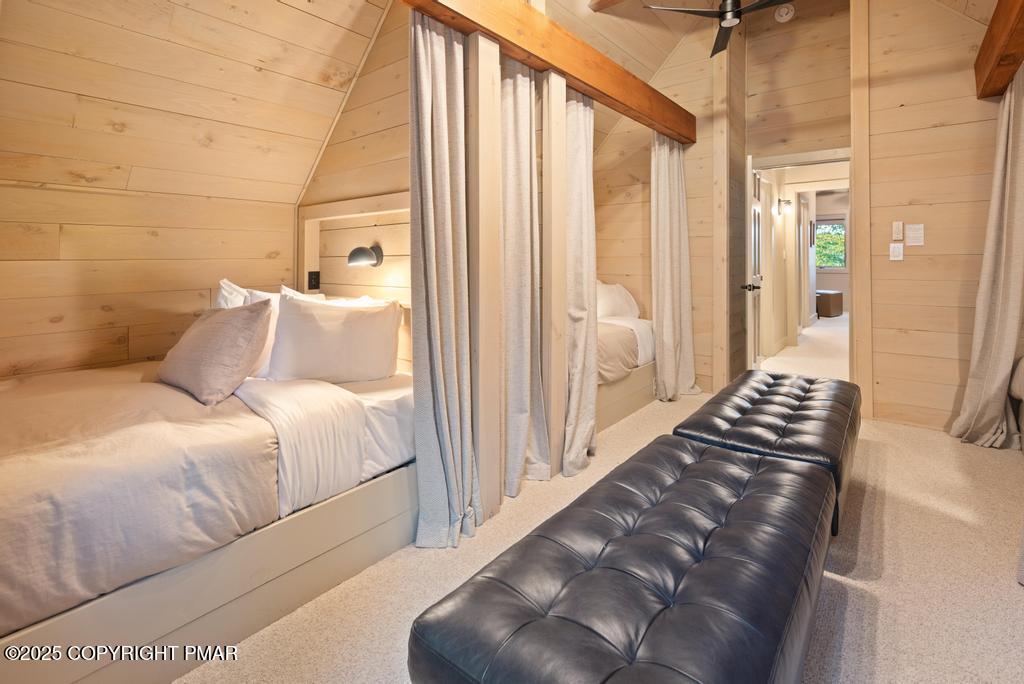 106 Waygood Way Pocono Pines, PA 18350 - Photo 29 of 66 a bedroom with a bed and a large window