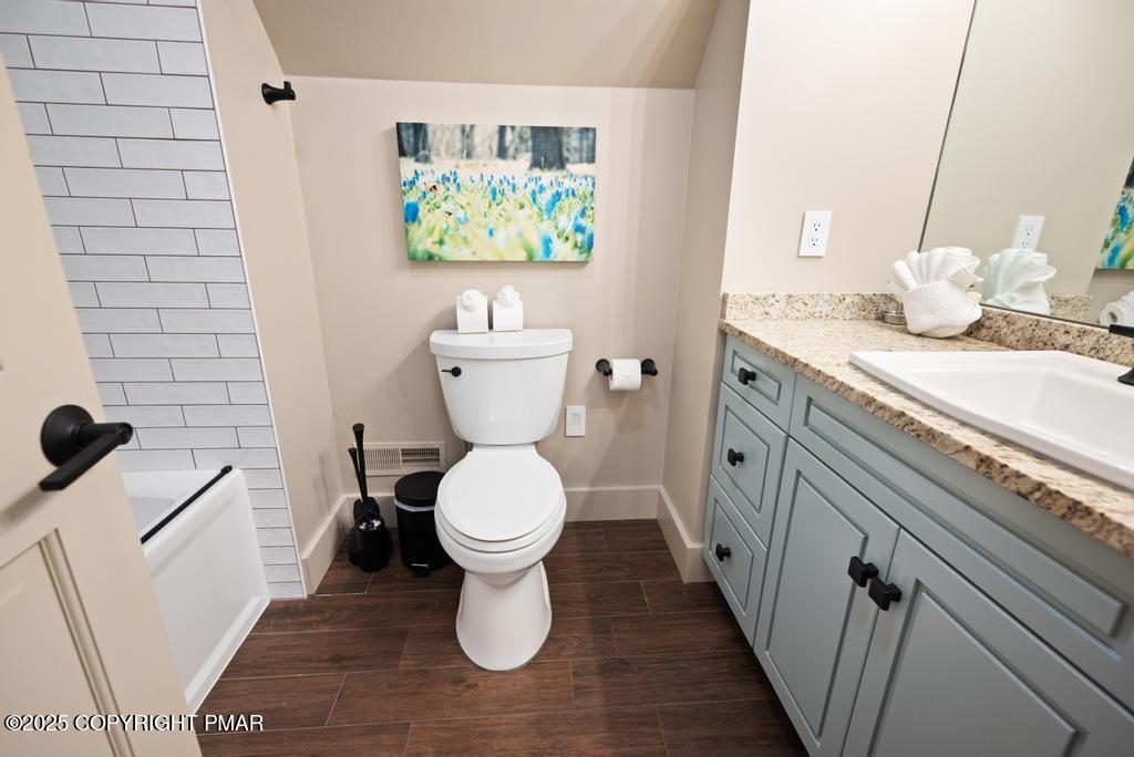 106 Waygood Way Pocono Pines, PA 18350 - Photo 30 of 66 a bathroom with a sink and a toilet