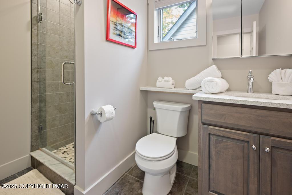 106 Waygood Way Pocono Pines, PA 18350 - Photo 40 of 66 a white toilet sitting next to a bathroom sink