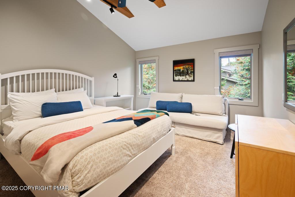 106 Waygood Way Pocono Pines, PA 18350 - Photo 41 of 66 a bedroom with a bed and a couch