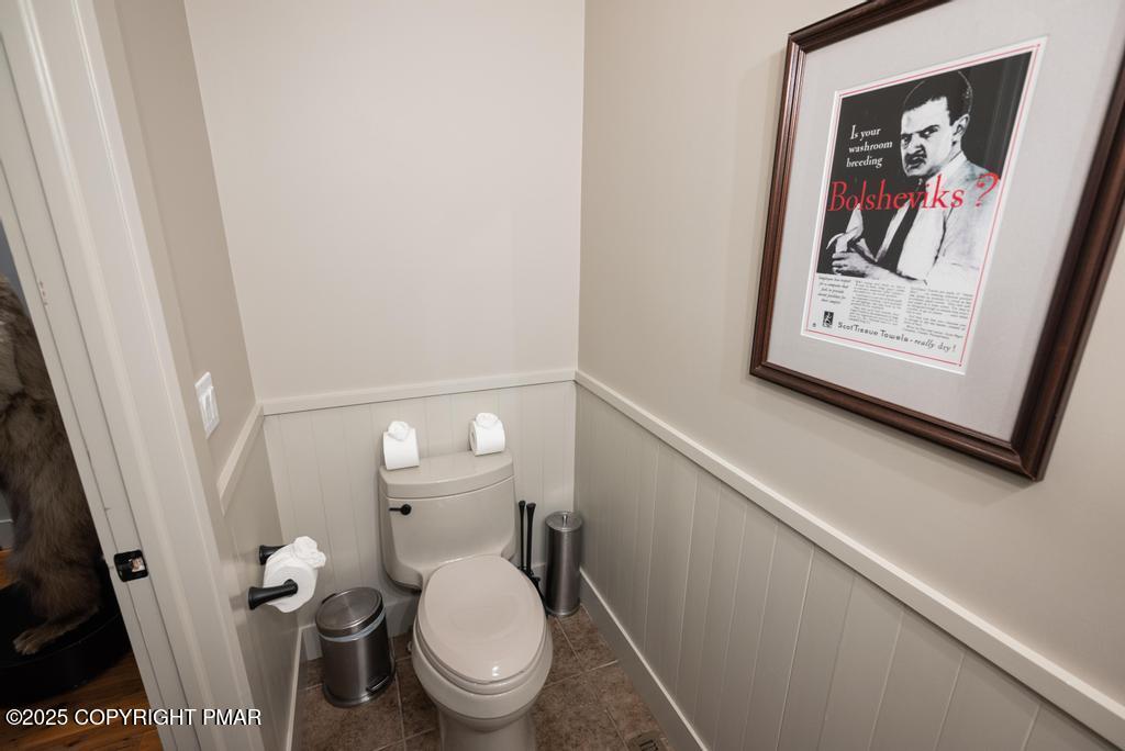 106 Waygood Way Pocono Pines, PA 18350 - Photo 45 of 66 a white toilet sitting next to a small bathroom
