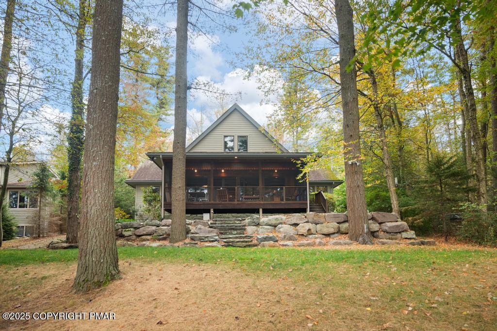 106 Waygood Way Pocono Pines, PA 18350 - Photo 59 of 66 a front view of a house with garden