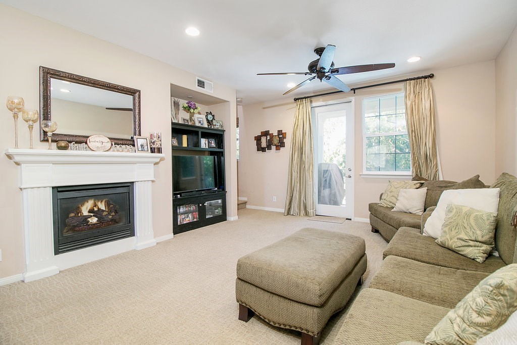 15205 Fairfax Way Tustin, CA 92782 - Photo 8 of 28 a living room with furniture and a fireplace
