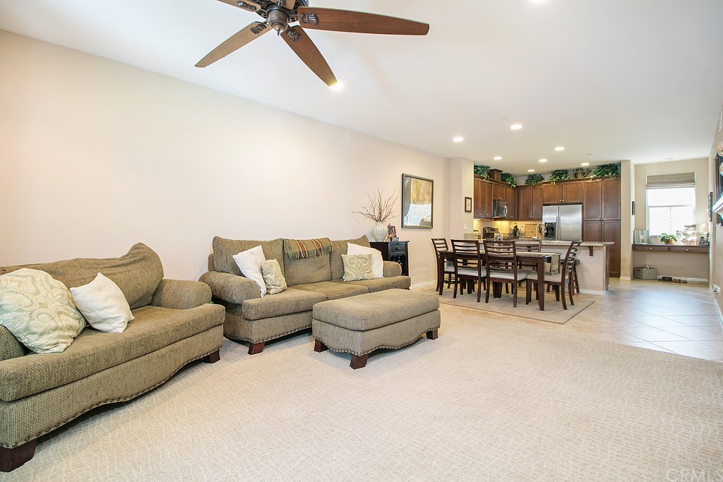 15205 Fairfax Way Tustin, CA 92782 - Photo 28 of 28 a living room with furniture and kitchen view