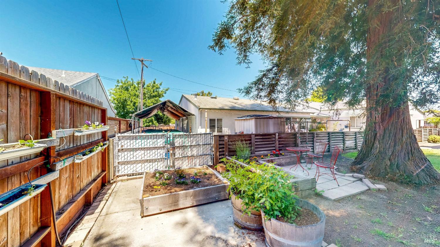 809 Maple Avenue Vallejo, CA 94591 - Photo 42 of 46 a view of a chairs and table in the backyard