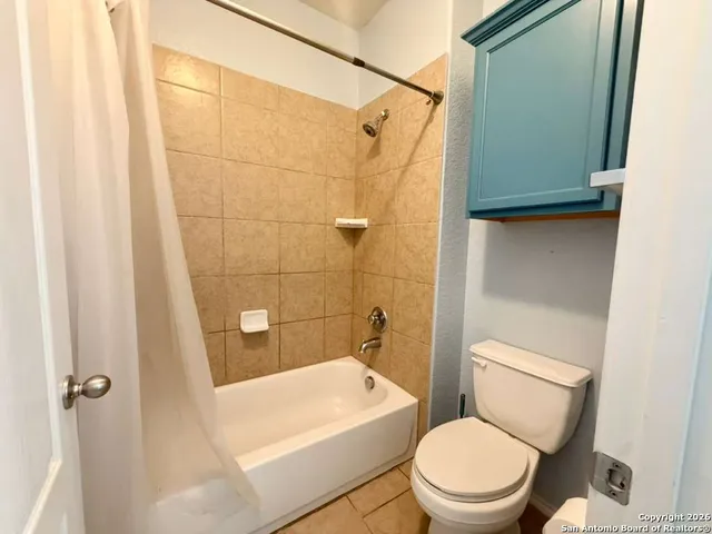 a view of a storage & utility room with closet