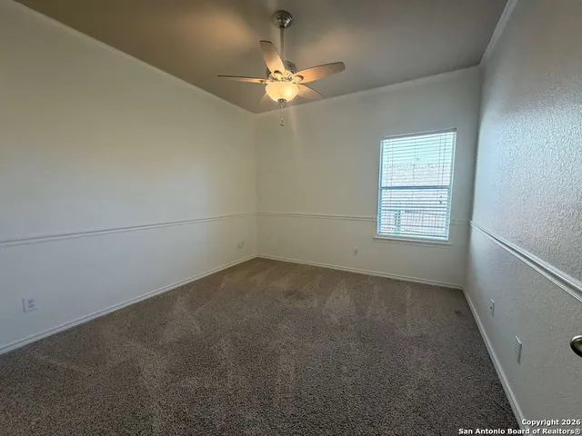 a view of a balcony with a large window