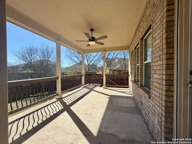 a view of porch with wooden floor