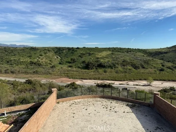 a view of a lake with a mountain