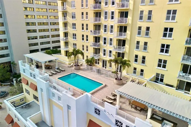 front view of a building with a garden